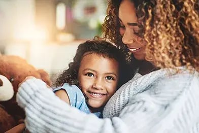 smiling-mom-and-daughter-392x262